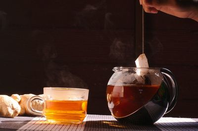 Glass of tea cup on table