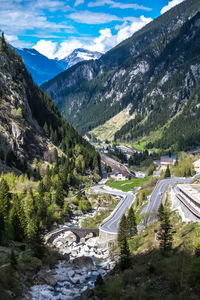 High angle view of road amidst mountains against sky