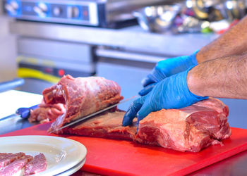 Close-up of man preparing food