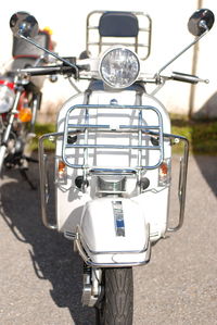 Close-up of bicycle parked on road