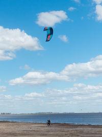 Kitesurfer and beautiful beach landscape