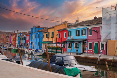 Boats moored at harbor