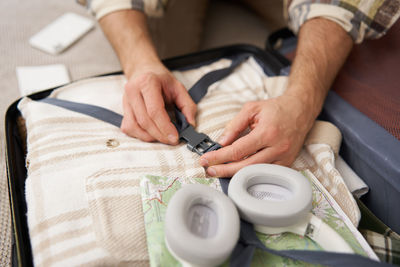 Midsection of man working at home