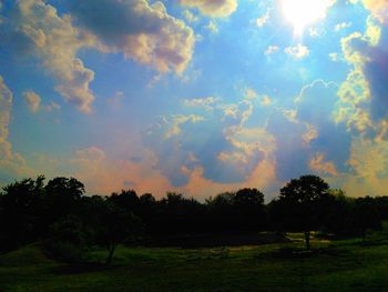 Scenic view of landscape against cloudy sky