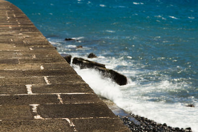 Close-up of sea waves splashing on shore