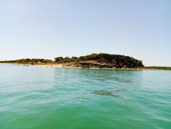 Scenic view of sea against clear sky