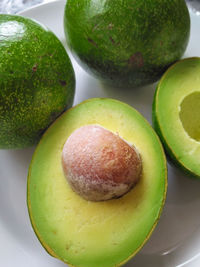 Close-up of fruits in plate on table