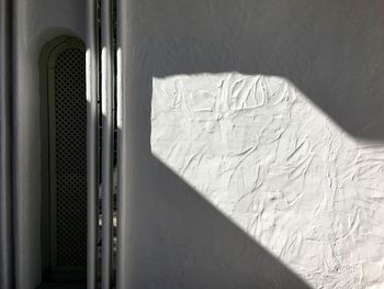 Close-up of shadow on white wall