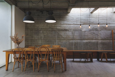 Empty chairs and tables in cafe