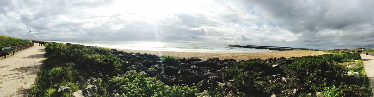 sea, beach, water, horizon over water, sky, shore, tranquil scene, scenics, tranquility, beauty in nature, sand, nature, cloud - sky, panoramic, coastline, idyllic, cloudy, sunlight, cloud, wave