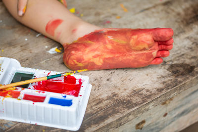 Close-up of person preparing food on cutting board