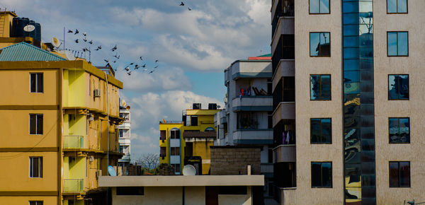 Low angle view of residential buildings against sky
