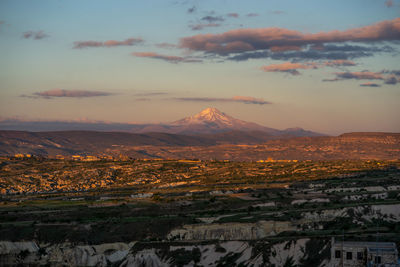 Aerial view of townscape against sky during sunset