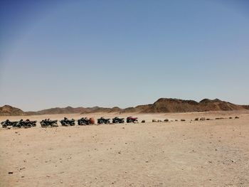 Scenic view of desert against clear sky