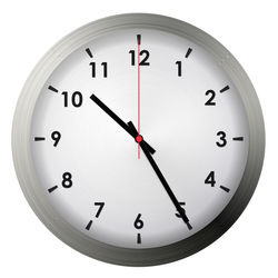 Close-up of clock over white background