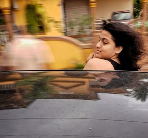 Teenage girl in moving car