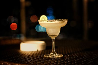 Close-up of wine glass on table