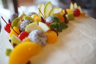 Close-up of fruits in plate on table