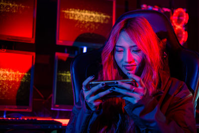 Young woman using mobile phone