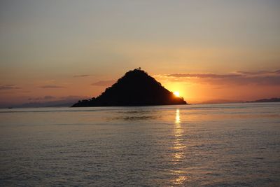 Scenic view of sea at sunset