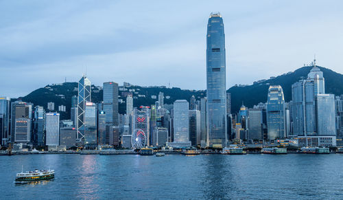 Ferry crossing victoria harbour in hong kong