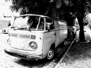 Old car on street in city