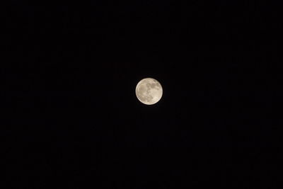 Low angle view of full moon in sky