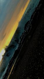 Scenic view of sea against dramatic sky