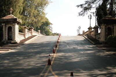 Street amidst buildings against sky