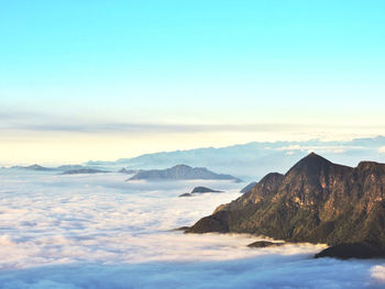 Scenic view of mountains against sky during sunset