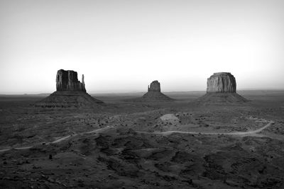 Panoramic view of rock formations against clear sky