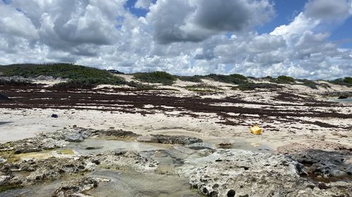 Scenic view of rocks against sky