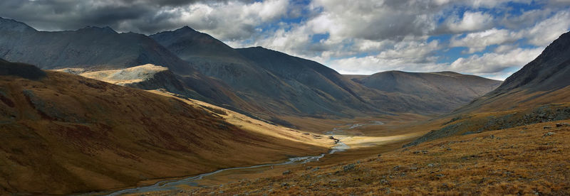 Panoramic view of mountains against sky