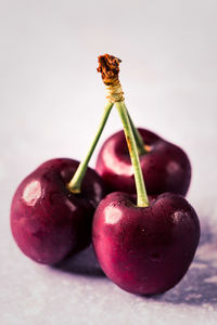 Close-up of cherries on table