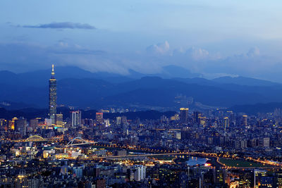 Aerial view of cityscape at night