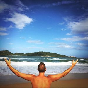 Rear view of woman on beach