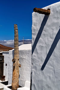 Low angle view of wooden gate