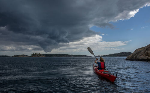 Boat on sea against sky