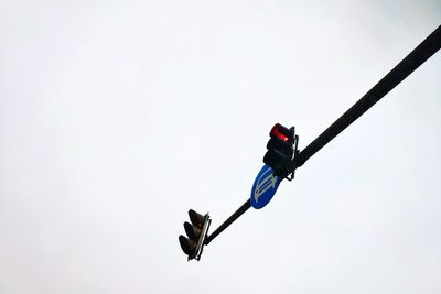 Low angle view of kite flying against clear sky