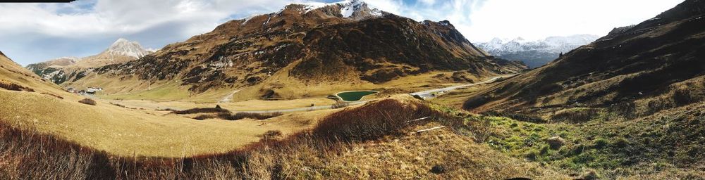 Panoramic view of landscape and mountains against sky