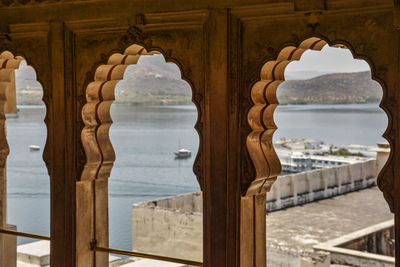 Close-up of mosque seen through building