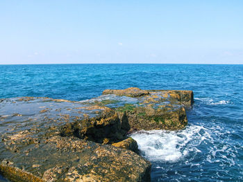 Scenic view of sea against clear sky