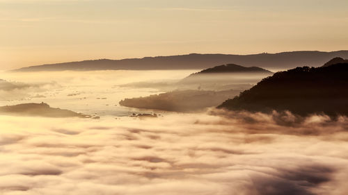 Scenic view of mountains against sky during sunset