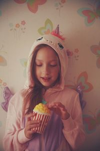 Portrait of a girl eating food