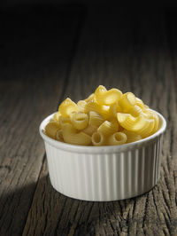 Close-up of macaroni pasta on table