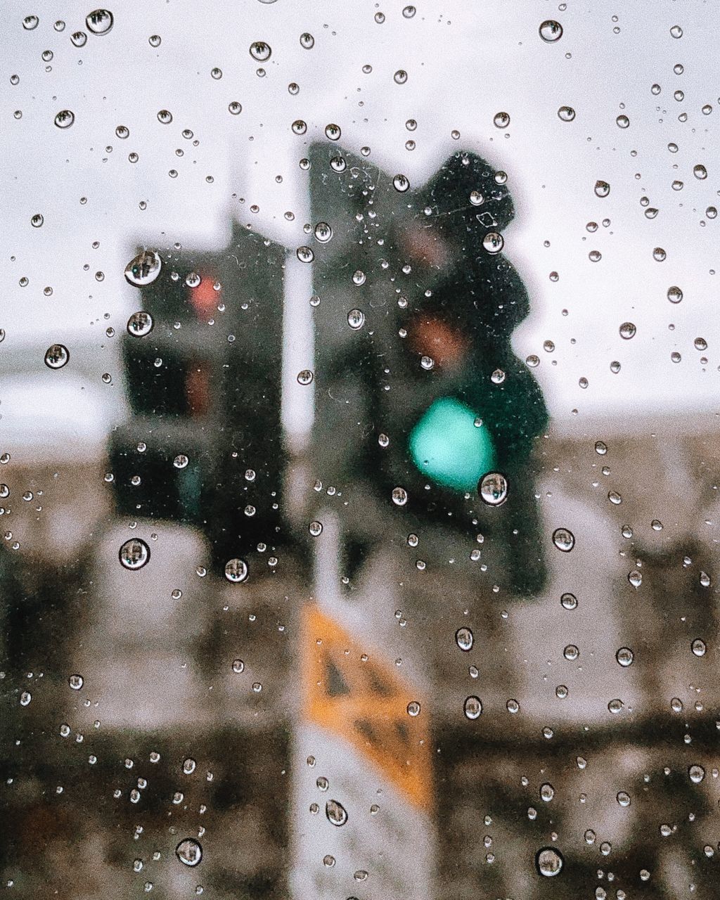 RAINDROPS ON GLASS WINDOW