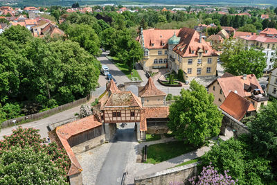 High angle view of townscape and trees in town