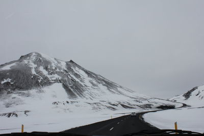 Scenic view of snow covered mountains