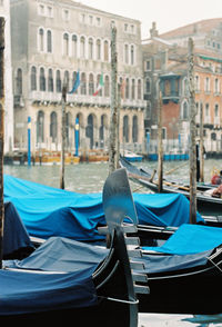 Close-up of boats moored in canal