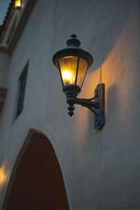 Low angle view of illuminated light bulb